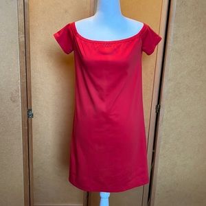 Small red cotton stretch dress with slightly wide neckline. Made in Spain